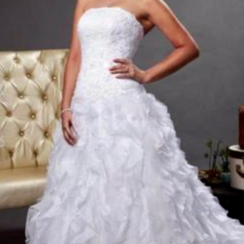 White wedding dress. Monique Luo, David’s Bridal